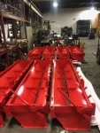 7 amerispreader chip spreaders shown just out of powder coating and ready for final assembly