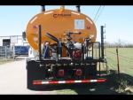 Etnyre distributor truck alternative, Stratos 2000 gallon distributor shown from rear, bolts to truck chassis, shown with 2 folding spray bar wing extensions for 14'