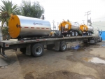 PavementGroup Stratos asphalt distributor trucks trailers shipping on a tractor trailer 3 at a time