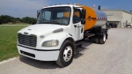 Asphalt Distributor truck, 2000 gallon truck capacity tank mounted on used Freightliner Truck chassis