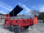 Asphalt recycler for sale, this is a Bagela BA10000 10 ton per hour asphalt recycler shown from the driver side rear with hydraulic loading bin in the up position, for sale - 518-218-7676